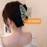 Pinza con forma de mariposa con perlas